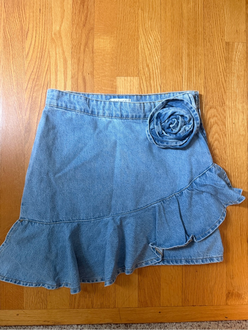 Light Blue Denim Mini Skirt with Ruffle Hem and Rosette